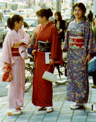 Three Women Wearing Kimonos
