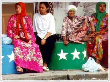 Malaysian Women Waiting for a Bus